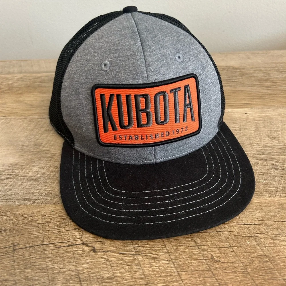 Kubota Tractor Emb. Patch on Kubota Brand Trucker Hat Snapback Black/orange - Picture 1 of 11